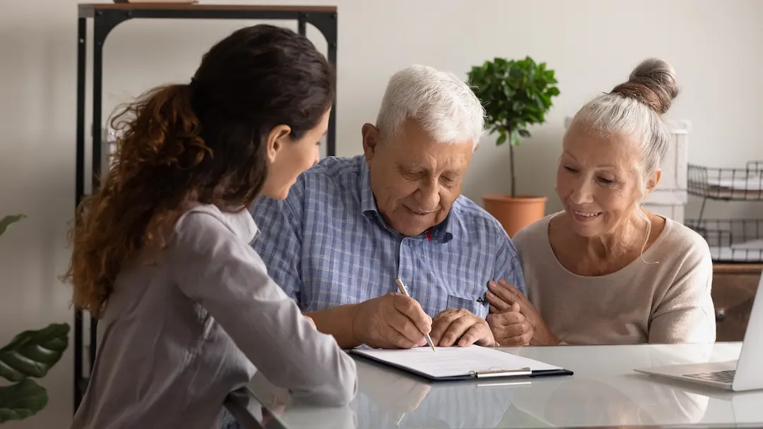 UK Will Writing Services for Expats – Fast, Legal & Stress-Free Happy Family Signing Documents